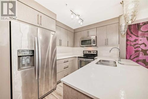 2103, 302 Skyview Ranch Drive Ne, Calgary, AB - Indoor Photo Showing Kitchen With Stainless Steel Kitchen With Double Sink With Upgraded Kitchen