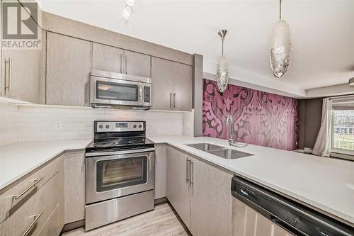 2103, 302 Skyview Ranch Drive Ne, Calgary, AB - Indoor Photo Showing Kitchen With Stainless Steel Kitchen With Double Sink With Upgraded Kitchen