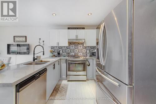 24 Ruffet Drive, Barrie, ON - Indoor Photo Showing Kitchen With Double Sink With Upgraded Kitchen