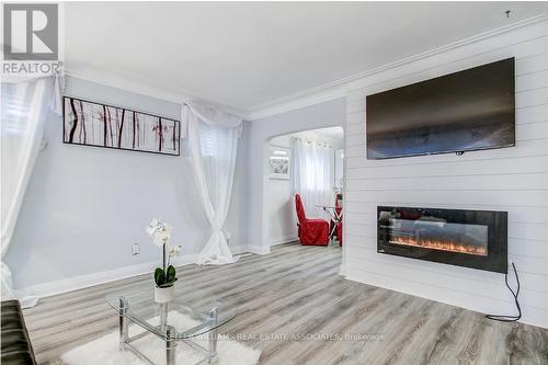 75 Tollgate Road, Brantford, ON - Indoor Photo Showing Living Room With Fireplace