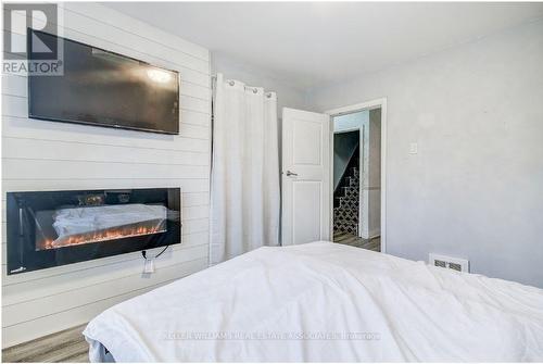 75 Tollgate Road, Brantford, ON - Indoor Photo Showing Bedroom With Fireplace