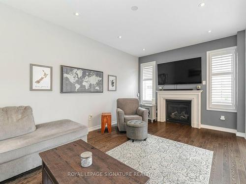 2 Hackett St, East Gwillimbury, ON - Indoor Photo Showing Living Room With Fireplace