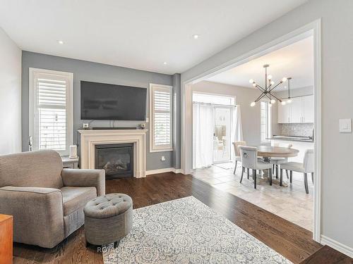 2 Hackett St, East Gwillimbury, ON - Indoor Photo Showing Living Room With Fireplace