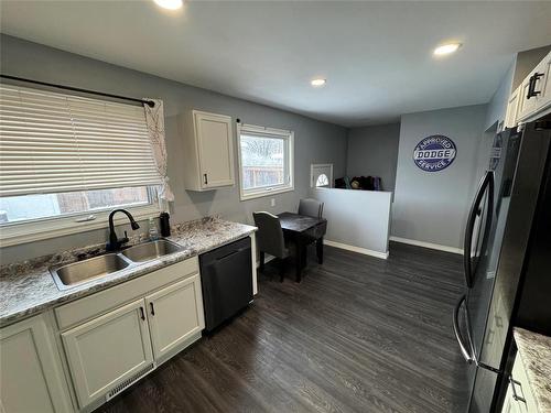 908 Lorne Avenue E, Brandon, MB - Indoor Photo Showing Kitchen With Double Sink