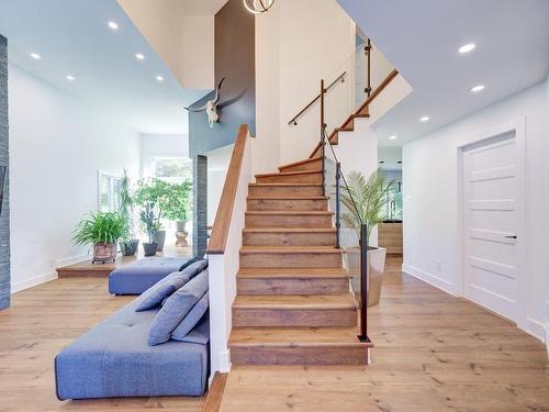 Staircase - 650 Mtée Du Village, Saint-Joseph-Du-Lac, QC - Indoor Photo Showing Other Room