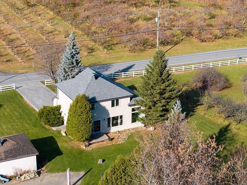 Aerial photo - 650 Mtée Du Village, Saint-Joseph-Du-Lac, QC - Outdoor With View