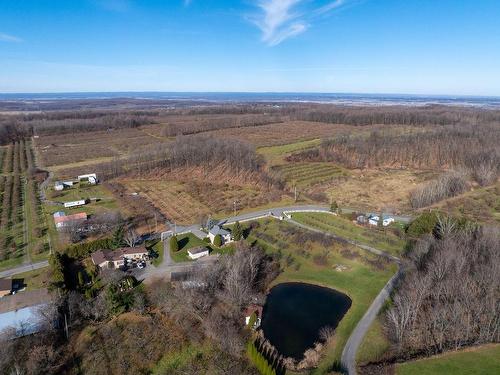 Aerial photo - 650 Mtée Du Village, Saint-Joseph-Du-Lac, QC - Outdoor With View