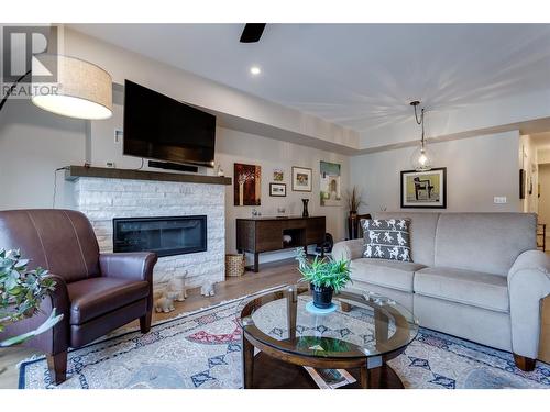 2161 Upper Sundance Drive Unit# 9, West Kelowna, BC - Indoor Photo Showing Living Room With Fireplace