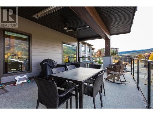 Covered deck with added heaters and ceiling fan - 2161 Upper Sundance Drive Unit# 9, West Kelowna, BC - Outdoor With Deck Patio Veranda With Exterior