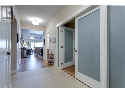 Double doors entering den - 2161 Upper Sundance Drive Unit# 9, West Kelowna, BC - Indoor Photo Showing Other Room