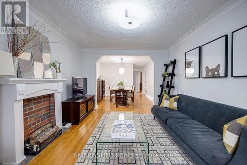 104 Cadorna Avenue, Toronto, ON - Indoor Photo Showing Living Room With Fireplace