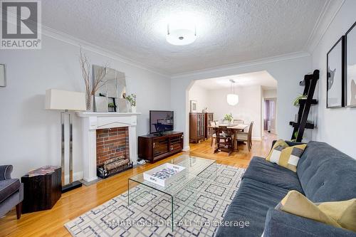 104 Cadorna Avenue, Toronto, ON - Indoor Photo Showing Living Room With Fireplace