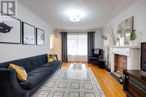 104 Cadorna Avenue, Toronto, ON - Indoor Photo Showing Living Room With Fireplace