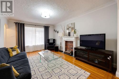 104 Cadorna Avenue, Toronto, ON - Indoor Photo Showing Living Room With Fireplace