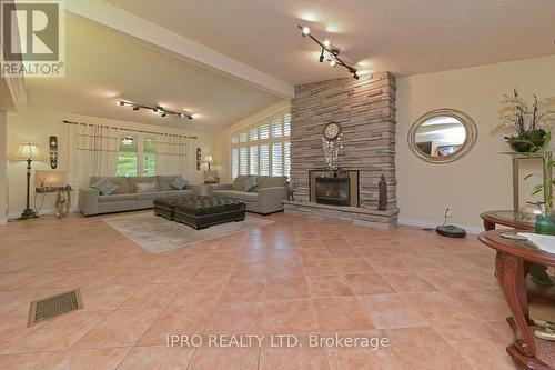 16 Cedar Drive, Caledon, ON - Indoor Photo Showing Living Room With Fireplace