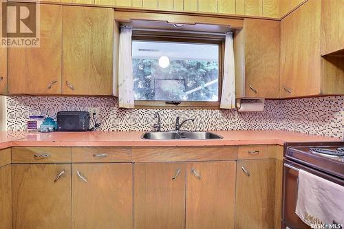 1360 Rothwell Street, Regina, SK - Indoor Photo Showing Kitchen With Double Sink