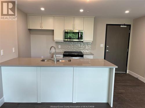 140 Main Street East Unit# 208, Kingsville, ON - Indoor Photo Showing Kitchen With Double Sink