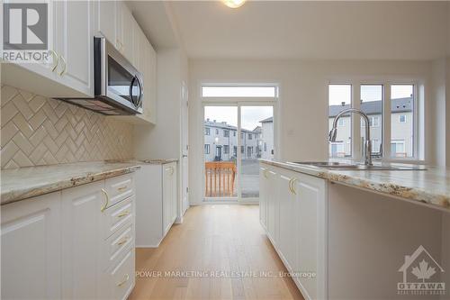 734 Sebastian Street, Ottawa, ON - Indoor Photo Showing Kitchen With Double Sink