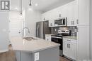 175 Kostiuk Crescent, Saskatoon, SK  - Indoor Photo Showing Kitchen With Double Sink With Upgraded Kitchen 