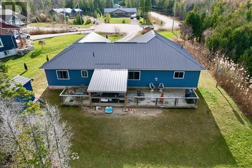 Rear view of property with a lawn - 1 Williamson Place, South Bruce Peninsula, ON - Outdoor With Deck Patio Veranda