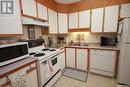 201 1002 108Th Street, North Battleford, SK  - Indoor Photo Showing Kitchen With Double Sink 