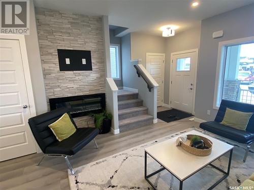 163 Kostiuk Crescent, Saskatoon, SK - Indoor Photo Showing Living Room With Fireplace