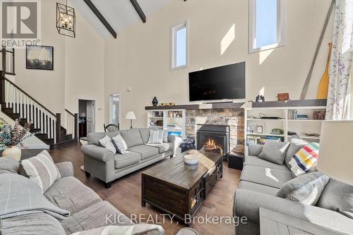 9 - 41 Rosedale Trail, Kawartha Lakes, ON - Indoor Photo Showing Living Room With Fireplace