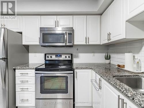 22 - 2488 Post Road, Oakville (Uptown Core), ON - Indoor Photo Showing Kitchen With Stainless Steel Kitchen With Upgraded Kitchen