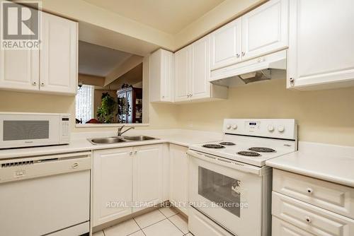 205 - 2628 Mccowan Road, Toronto, ON - Indoor Photo Showing Kitchen With Double Sink