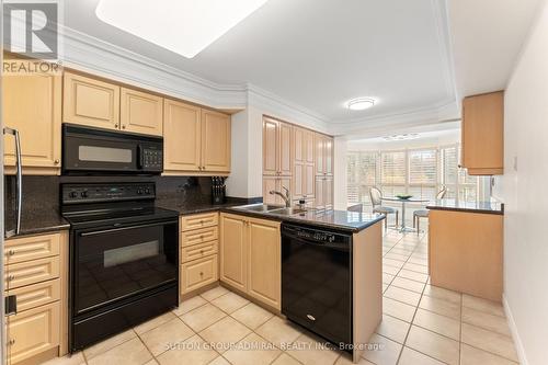 410 - 1 Clark Avenue W, Vaughan, ON - Indoor Photo Showing Kitchen With Double Sink