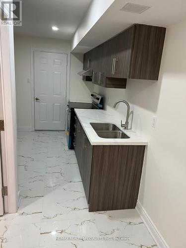 Bsmt - 10 Brent Stephens Way, Brampton, ON - Indoor Photo Showing Kitchen With Double Sink