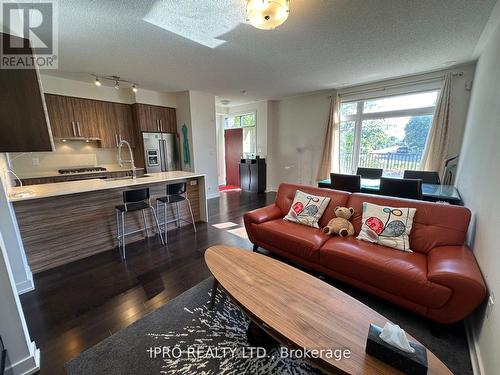 9 - 4020 Parkside Village Drive, Mississauga, ON - Indoor Photo Showing Living Room