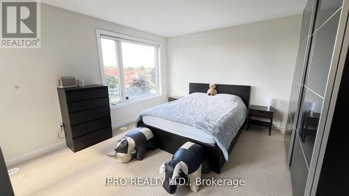 9 - 4020 Parkside Village Drive, Mississauga, ON - Indoor Photo Showing Bedroom