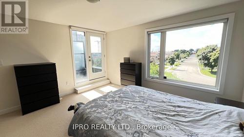 9 - 4020 Parkside Village Drive, Mississauga, ON - Indoor Photo Showing Bedroom