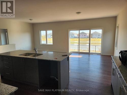 133 Ellen Street S, North Perth, ON - Indoor Photo Showing Kitchen With Double Sink