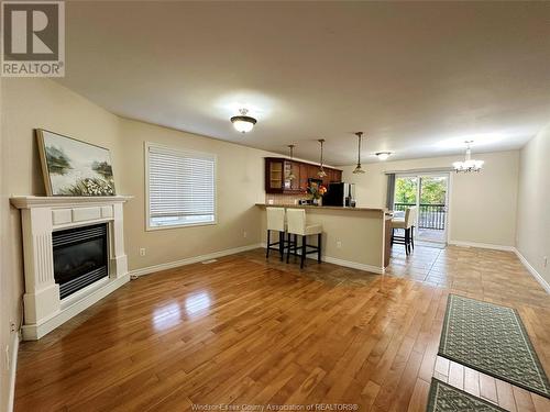 1129 Clover Avenue Unit# Main, Windsor, ON - Indoor Photo Showing Living Room With Fireplace