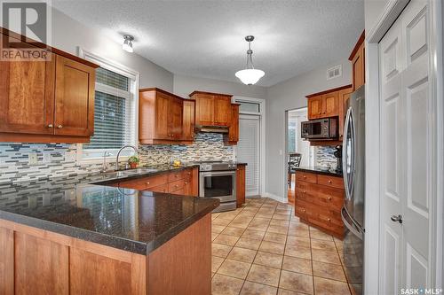 923 Brookhurst Lane, Saskatoon, SK - Indoor Photo Showing Kitchen With Double Sink