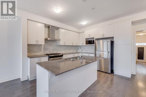 3165 Mintwood Circle, Oakville, ON - Indoor Photo Showing Kitchen With Stainless Steel Kitchen With Double Sink