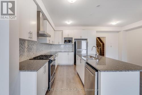 3165 Mintwood Circle, Oakville, ON - Indoor Photo Showing Kitchen With Stainless Steel Kitchen With Double Sink With Upgraded Kitchen