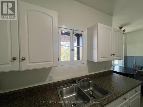 4 - 80 Bridge Street W, Belleville, ON - Indoor Photo Showing Kitchen With Double Sink