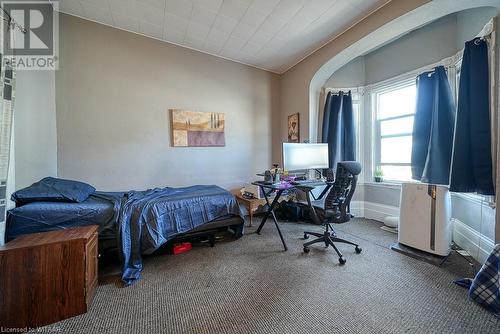 Bedroom with carpet floors - 742 Dundas Street, Woodstock, ON - Indoor Photo Showing Bedroom