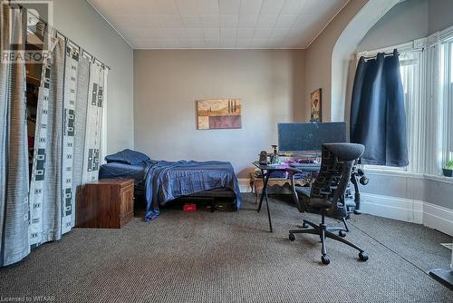 View of carpeted bedroom - 742 Dundas Street, Woodstock, ON - Indoor Photo Showing Bedroom