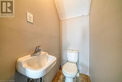 Bathroom featuring toilet and sink - 