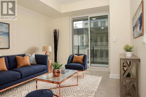 814 - 3220 William Coltson Avenue N, Oakville, ON - Indoor Photo Showing Living Room