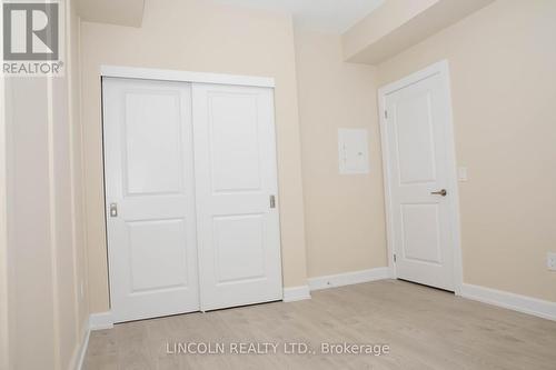 814 - 3220 William Coltson Avenue N, Oakville, ON - Indoor Photo Showing Other Room