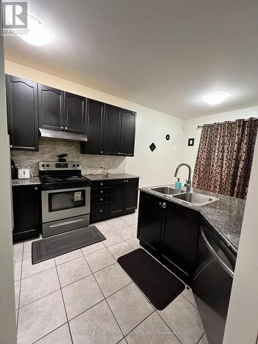 49 Baby Pointe Trail, Brampton, ON - Indoor Photo Showing Kitchen With Double Sink