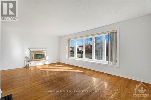 17 Domus Crescent, Ottawa, ON - Indoor Photo Showing Living Room With Fireplace