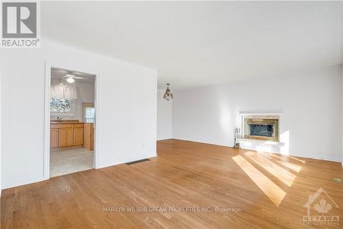 17 Domus Crescent, Ottawa, ON - Indoor Photo Showing Living Room With Fireplace