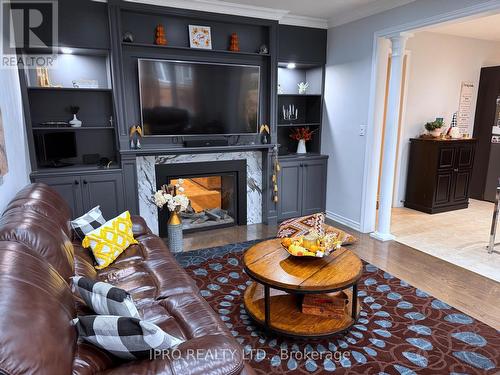 27 Tysonville Circle, Brampton, ON - Indoor Photo Showing Living Room With Fireplace