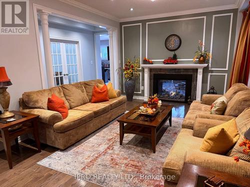 27 Tysonville Circle, Brampton, ON - Indoor Photo Showing Living Room With Fireplace